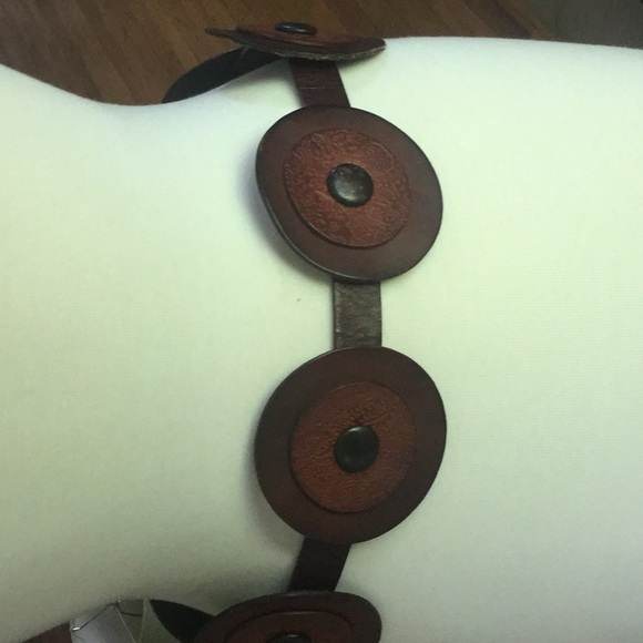 Leather belt with medallions embossed brass
